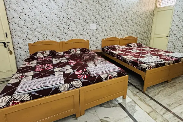Non AC pilgrim room at Shegaon Bhakta Niwas Dwarka Gujarat